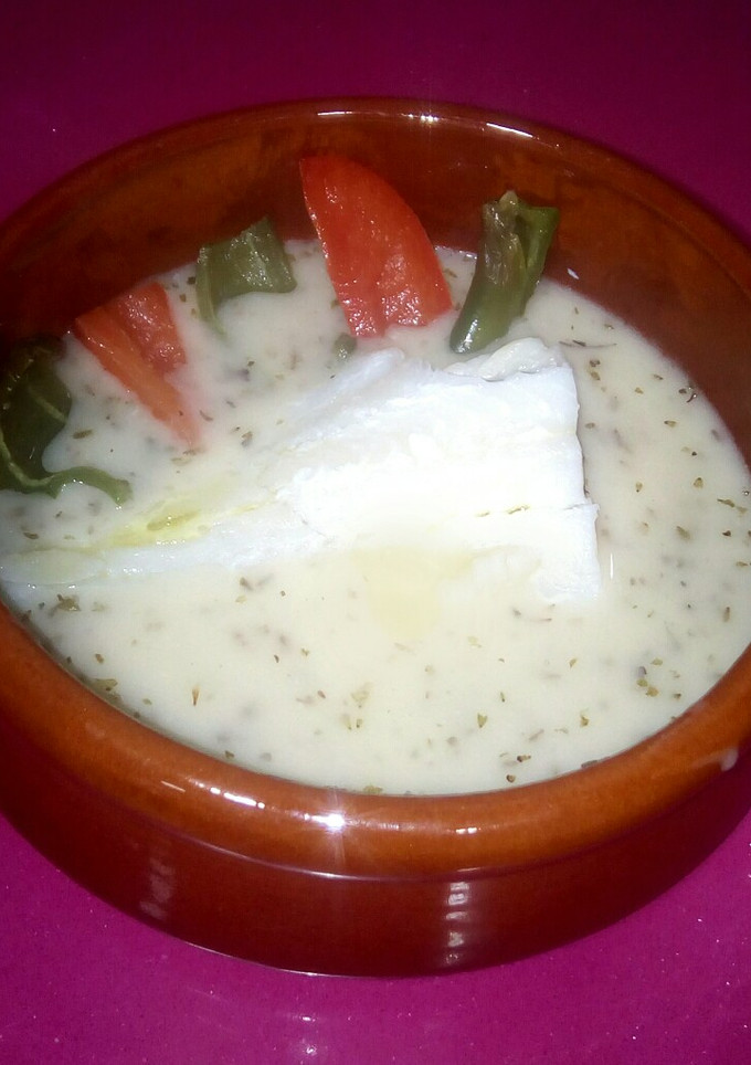 Una foto de Bacalao en salsa verde