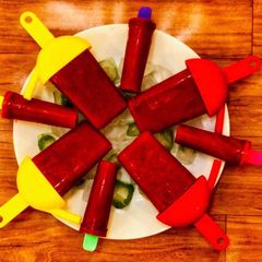 A picture of Watermelon strawberry lemonade popsicles.