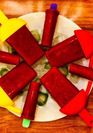 A picture of Watermelon strawberry lemonade popsicles.