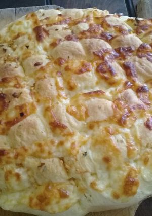 Una foto de Pan de ajo y queso🧀