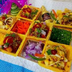 A picture of Ragda patties and pasta canapes chat.