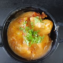 A picture of Baby potatoes in cornflour gravy.