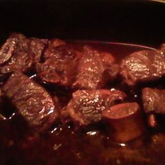 A picture of Braised short ribs with red wine.