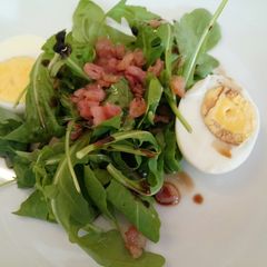 A picture of Rocket, egg and pancetta salad.