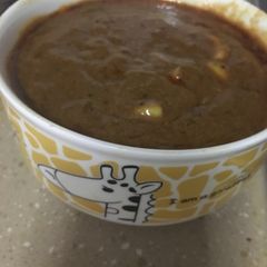 Pepper kulambu (gravy) A picture of Pepper kulambu (gravy).
