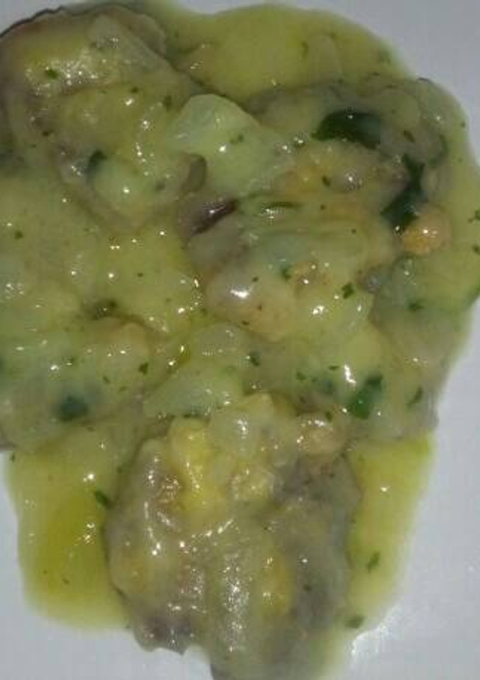 Una foto de Lengua de cerdo encebollada