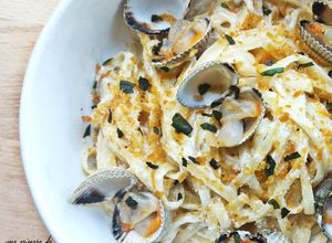 Une photo de Linguines crémeux coques, citron et poutargue