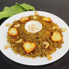 A picture of Palak Paneer Pulao In Pressure Cooker.
