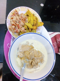 A picture of Fried sweet potato with pap and milk.