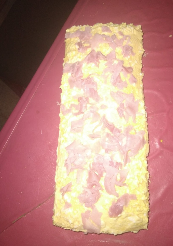 Una foto de Pionono relleno salado