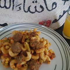 A picture of Beef rounds in sauce.