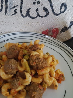 A picture of Beef rounds in sauce.