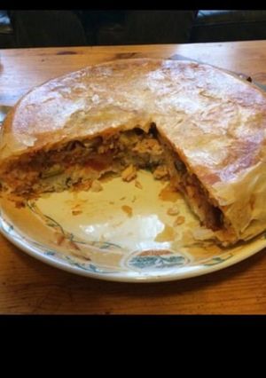 Une photo de Tourte de feuilles de brick au riz tomates oignons et courgettes et basilic