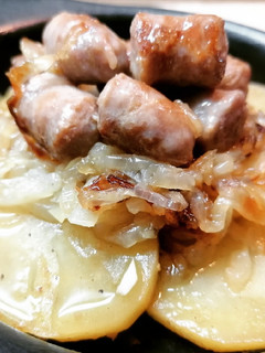 Una foto de Salchichas encebolladas al cava