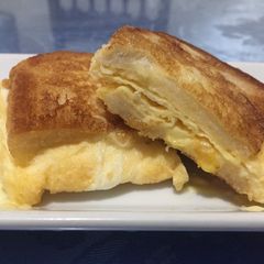 A picture of Egg and cheese grilled sandwich.