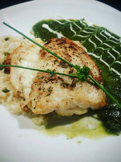 Una foto de Filete de bagre en espejo de pimiento