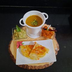 A picture of Schezwan sandwich dosa.