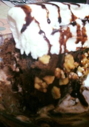 A picture of Brownie with Vanilla ice cream.