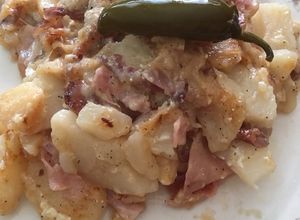 Una foto de Papas gratinadas con jamón