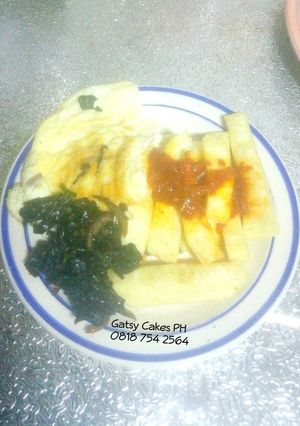 A picture of Fried yam, omelette and stir-fry leafy vegetables.