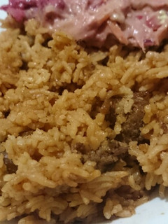 A picture of Beef Pilau and kachumbari.