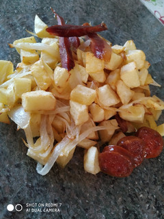Una foto de Patatas con cebolleta