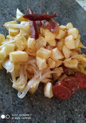 Una foto de Patatas con cebolleta