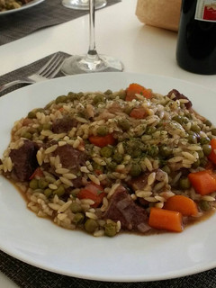 A picture of Beef Ragout with Peas and Orzo Pasta.