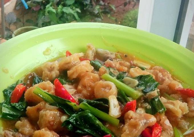 Cumi Tepung masak Asam Pedas