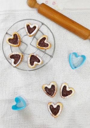 Foto di Biscotti di pasta frolla all'olio con crema al cioccolato light
