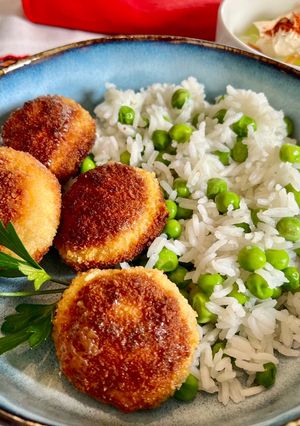 Une photo de Champignons de Paris panés, riz aux petits pois