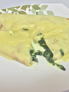 Una foto de Panqueques relleno de espinacas