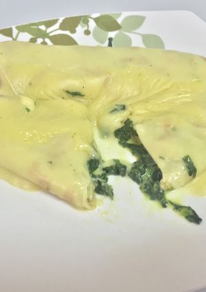 Una foto de Panqueques relleno de espinacas