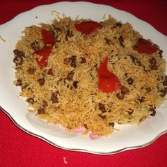 A picture of Achari kala chana pulao.