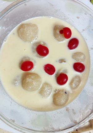 A picture of Coconut Suji rasmalai.
