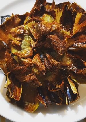 Una foto de Carciofi alla giudia (alcauciles fritos)