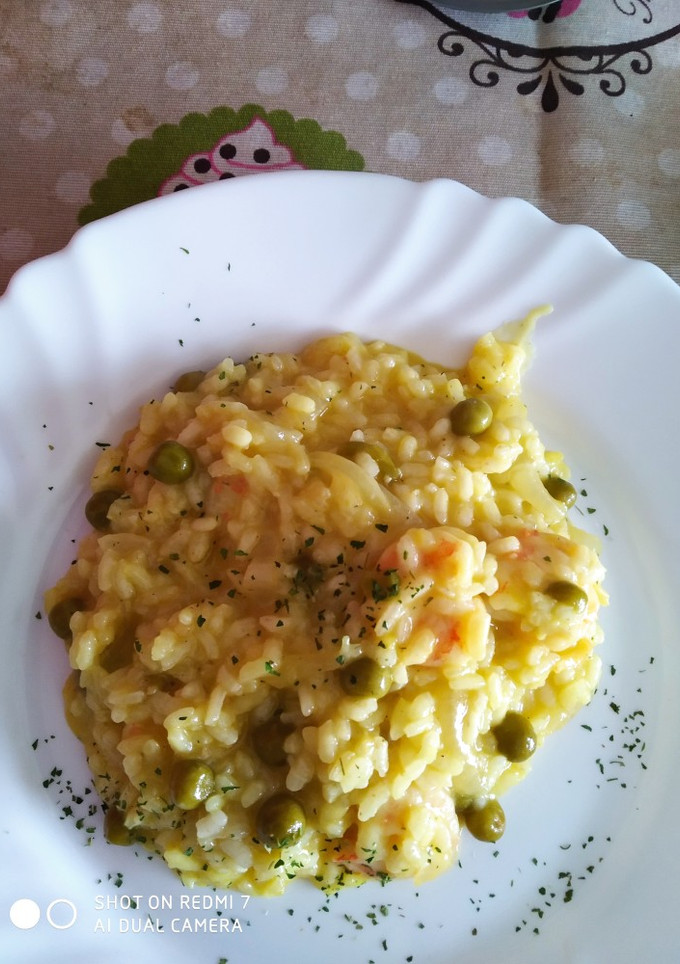 Una foto de Risotto de langostinos a la Mozarella 😋