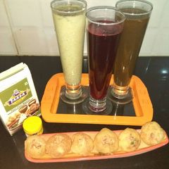 Thrilling drink with pani puri A picture of Thrilling drink with pani puri.