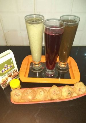 A picture of Thrilling drink with pani puri.