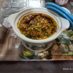A picture of Resturant style Punjabi kadhi pakora.