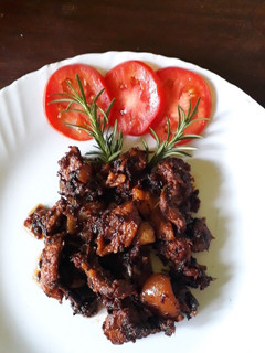 A picture of Spicy Mbuzi Ulaya aka Pork Meat, with some honey#authormarathon#.