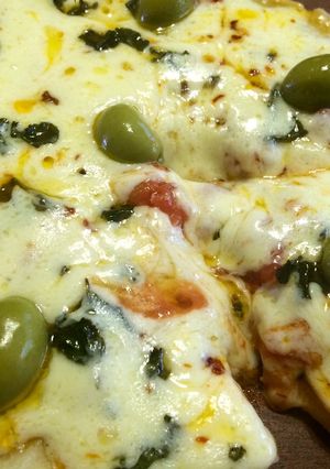 Una foto de Pizza de provolone apta celíacos