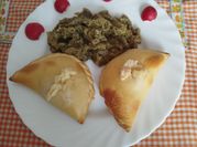 Una foto de empanada de bacon y queso
