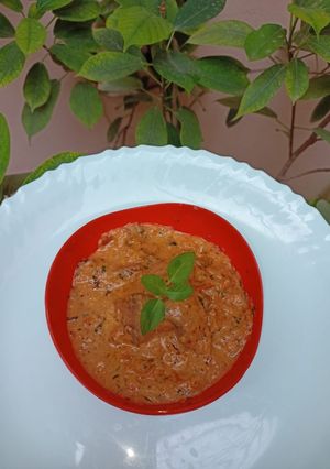 A picture of Mushroom in red thai gravy.