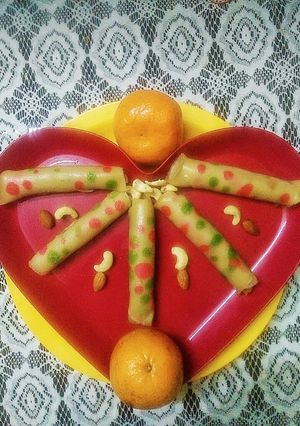 অরেন্জ ডিজাইনার পাটিসাপ্টা (orange designer patisapta recipe in Bengali) রেসিপির প্রধান ছবি