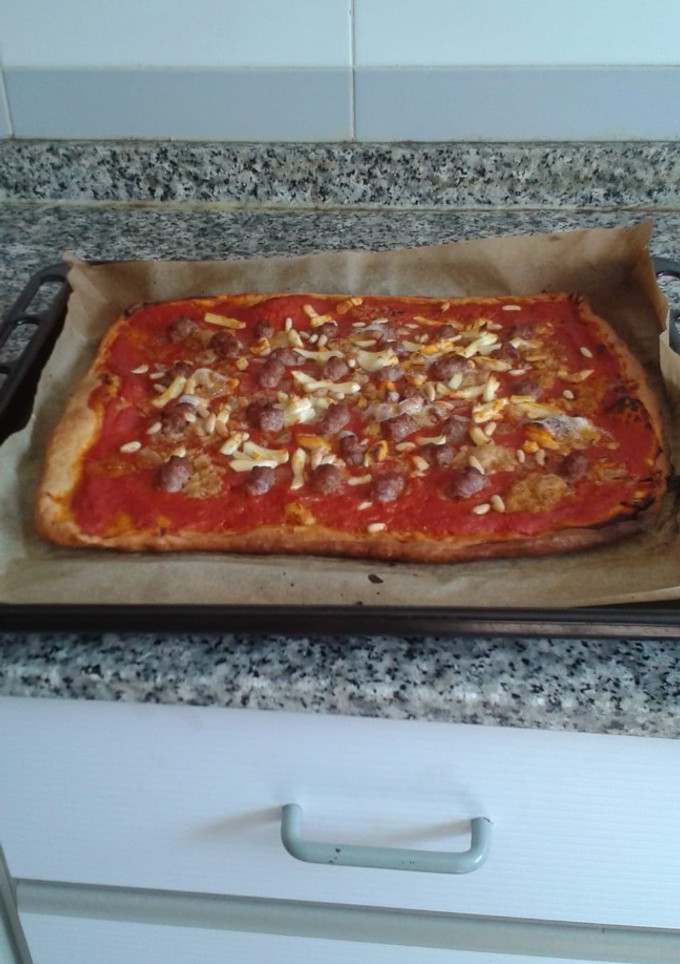 Una foto de Coca de tomate rápida