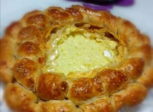 Foto principal de Rosca de queso camembert y Frankfurt (hojaldre)