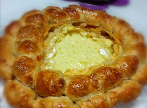 Foto principal de Rosca de queso camembert y Frankfurt (hojaldre)