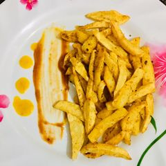 A picture of Mixed herbs and Garlic Fries.