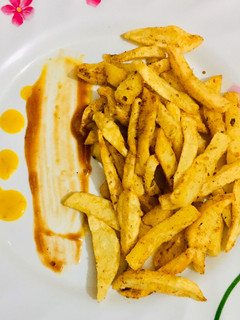 A picture of Mixed herbs and Garlic Fries.